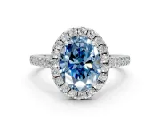 Halo Engagement Ring Setting for Fancy Blue Oval Center with Narrowing Pave Band and Prong Head in White Gold
