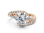 Solitaire Engagement Ring Setting for Round Cut Center with Pave Bypass Twist Band and Prong Head in Rose Gold