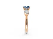 3 Stone Engagement Ring Setting for Fancy Blue Cushion Cut Center with Large Pear-Shaped Accents and Prong Head in Rose Gold