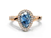 Halo Engagement Ring Setting for Fancy Blue Pear-Shaped Center with Pave and Plain Twist Band and Prong Head in Rose Gold