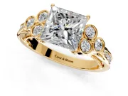 Cluster Engagement Ring Setting for Princess Cut Center with Bezel Accent Clusters and Prong Head in Yellow Gold