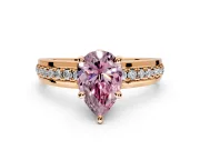 Solitaire Engagement Ring Setting for Fancy Pink Pear-Shaped Center with Raised Channel Band and Prong Head in Rose Gold