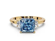 3 Stone Engagement Ring Setting for Fancy Blue Princess Cut Center with Wide Plain Band and Prong Head in Yellow Gold