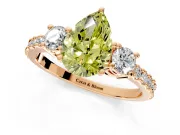 3 Stone Engagement Ring Setting for Fancy Yellow Pear-Shaped Center with Round Cut Side Accents and Prong Head in Rose Gold