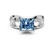 Solitaire Engagement Ring Setting for Fancy Blue Princess Cut Center with Criss-Cross Accent Band and Prong Head in Platinum
