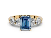 5 Stone Engagement Ring Setting for Fancy Blue Emerald Cut Center with Graduated Accents and Prong Head in Yellow Gold