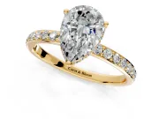 Hidden Halo Engagement Ring Setting for Pear-Shaped Center with Pave Band and Prong Head in Yellow Gold
