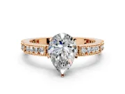 Solitaire Engagement Ring Setting for Pear-Shaped Center with Milgrain-Edged Pave Band and Prong Head in Rose Gold
