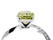 Side Accent Engagement Ring Setting for Fancy Yellow Radiant Cut Center with Accent Shoulders and Prong Head in Platinum
