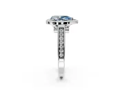 Halo Engagement Ring Setting for Fancy Blue Pear-Shaped Center with Outer Bezel Rim, Pave Band and Prong Head in Platinum