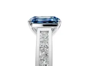 Solitaire Engagement Ring Setting for Fancy Blue Emerald Cut Center with Princess Cut Channel Band and Prong Head in Sterling Silver