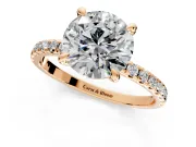 Solitaire Engagement Ring Setting for Round Cut Center with Fine Pave Narrow Band and Prong Head in Rose Gold