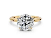 Low-Set Solitaire Engagement Ring Setting for Round Cut Center with Thin Plain Band and Prong Head in Yellow Gold