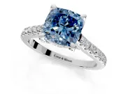 Solitaire Engagement Ring Setting for Fancy Blue Cushion Cut Center with Widening Pave Band and Claw Prong Head in Platinum