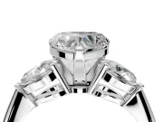 3 Stone Engagement Ring Setting for Heart-Shaped Center with Large Pear-Shaped Accents and Prong Head in Platinum