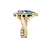 Halo Engagement Ring Setting for Fancy Blue Pear-Shaped Center with Pave and Plain Twist Band and Prong Head in Yellow Gold