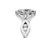 Solitaire Engagement Ring Setting for Oval Center with Accented Twist Band and Leaf Prong Head in Platinum