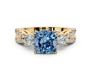 3 Stone Engagement Ring Setting for Fancy Blue Cushion Cut Center with Pave Split Shank and Prong Head in Yellow Gold