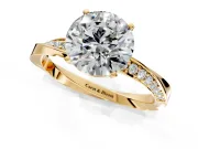 Side Accent Engagement Ring Setting for Round Cut Center with Accent Shoulders and Prong Head in Yellow Gold