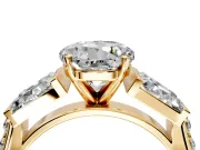 Channel-Set Engagement Ring Setting for Round Cut Center with Baguette Band and Prong Head in Yellow Gold