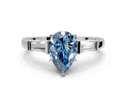 3 Stone Engagement Ring Setting for Fancy Blue Pear-Shaped Center with Channel Baguette Accents and Prong Head in Sterling Silver
