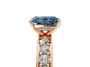 Solitaire Engagement Ring Setting for Fancy Blue Emerald Cut Center with Channel-Set Accents and Prong Head in Rose Gold