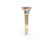 Channel-Set Engagement Ring Setting for Fancy Pink Pear-Shaped Center with Baguette Band and Prong Head in Yellow Gold