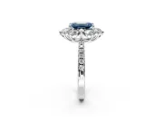 Floral Halo Engagement Ring Setting for Fancy Blue Emerald Cut Center with Pave Accents and Prong Head in Platinum