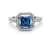 Halo Engagement Ring Setting for Fancy Blue Asscher Cut Center with Narrowing Pave Band and Prong Head in White Gold