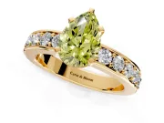 Solitaire Engagement Ring Setting for Fancy Yellow Pear-Shaped Center with Channel-Set Accents and Prong Head in Yellow Gold