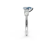 3 Stone Engagement Ring Setting for Fancy Blue Pear-Shaped Center with Large Pear-Shaped Accents and Prong Head in Sterling Silver