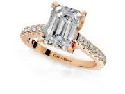Solitaire Engagement Ring Setting for Emerald Cut Center with Widening Pave Band and Claw Prong Head in Rose Gold