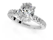 Solitaire Engagement Ring Setting for Oval Center with Single Row Accent Band and Prong Head in Platinum