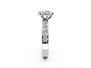 Solitaire Engagement Ring Setting for Pear-Shaped Center with Channel-Set Accents and Prong Head in Platinum