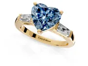 3 Stone Engagement Ring Setting for Fancy Blue Heart-Shaped Center with Tapered Baguettes, Plain Band and Prong Head in Yellow Gold