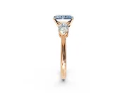 3 Stone Engagement Ring Setting for Fancy Blue Radiant Cut Center with Large Pear-Shaped Accents and Prong Head in Rose Gold