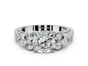 Cluster Engagement Ring Setting for Cushion Cut Center with Bezel Accent Clusters and Prong Head in Platinum