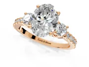 3 Stone Engagement Ring Setting for Oval Center with Round Cut Side Accents and Prong Head in Rose Gold