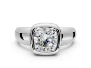 Solitaire Engagement Ring Setting for Cushion Cut Center with Wide Band and Bezel Head in Platinum