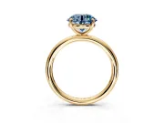 Low-Set Solitaire Engagement Ring Setting for Fancy Blue Round Cut Center with Thin Plain Band and Prong Head in Yellow Gold