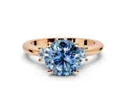 3 Stone Engagement Ring Setting for Fancy Blue Round Cut Center with Wide Plain Band and Prong Head in Rose Gold