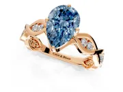 Solitaire Engagement Ring Setting for Fancy Blue Pear-Shaped Center with Accented Twist Band and Leaf Prong Head in Rose Gold