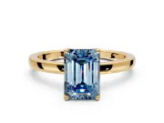 Solitaire Engagement Ring Setting for Fancy Blue Emerald Cut Center with Thin Rounded Plain Band and Prong Head in Yellow Gold