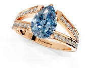Split Shank Engagement Ring Setting for Fancy Blue Pear-Shaped Center with Pave Split Shank and Prong Head in Rose Gold