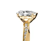 Side Accent Engagement Ring Setting for Pear-Shaped Center with Accent Shoulders and Prong Head in Yellow Gold