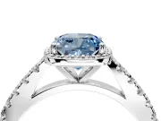 Halo Engagement Ring Setting for Fancy Blue Cushion Cut Center with Full Pave Band and Prong Head in White Gold