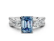 3 Stone Engagement Ring Setting for Fancy Blue Emerald Cut Center with Pave Split Shank and Prong Head in White Gold