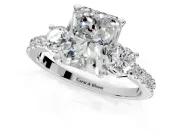3 Stone Engagement Ring Setting for Radiant Cut Center with Round Cut Side Accents and Prong Head in Platinum