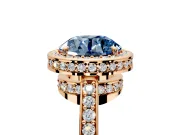 Halo Engagement Ring Setting for Fancy Blue Round Cut Center with Metal-Rimmed Halo, Pave Band and Prong Head in Rose Gold