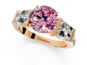Channel-Set Engagement Ring Setting for Fancy Pink Round Cut Center with Baguette Band and Prong Head in Rose Gold